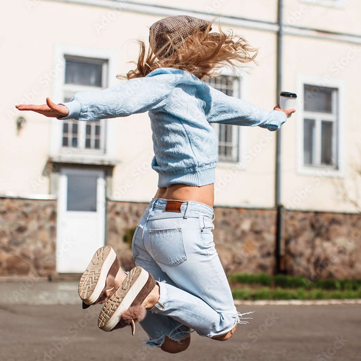 Woman jumping in the air